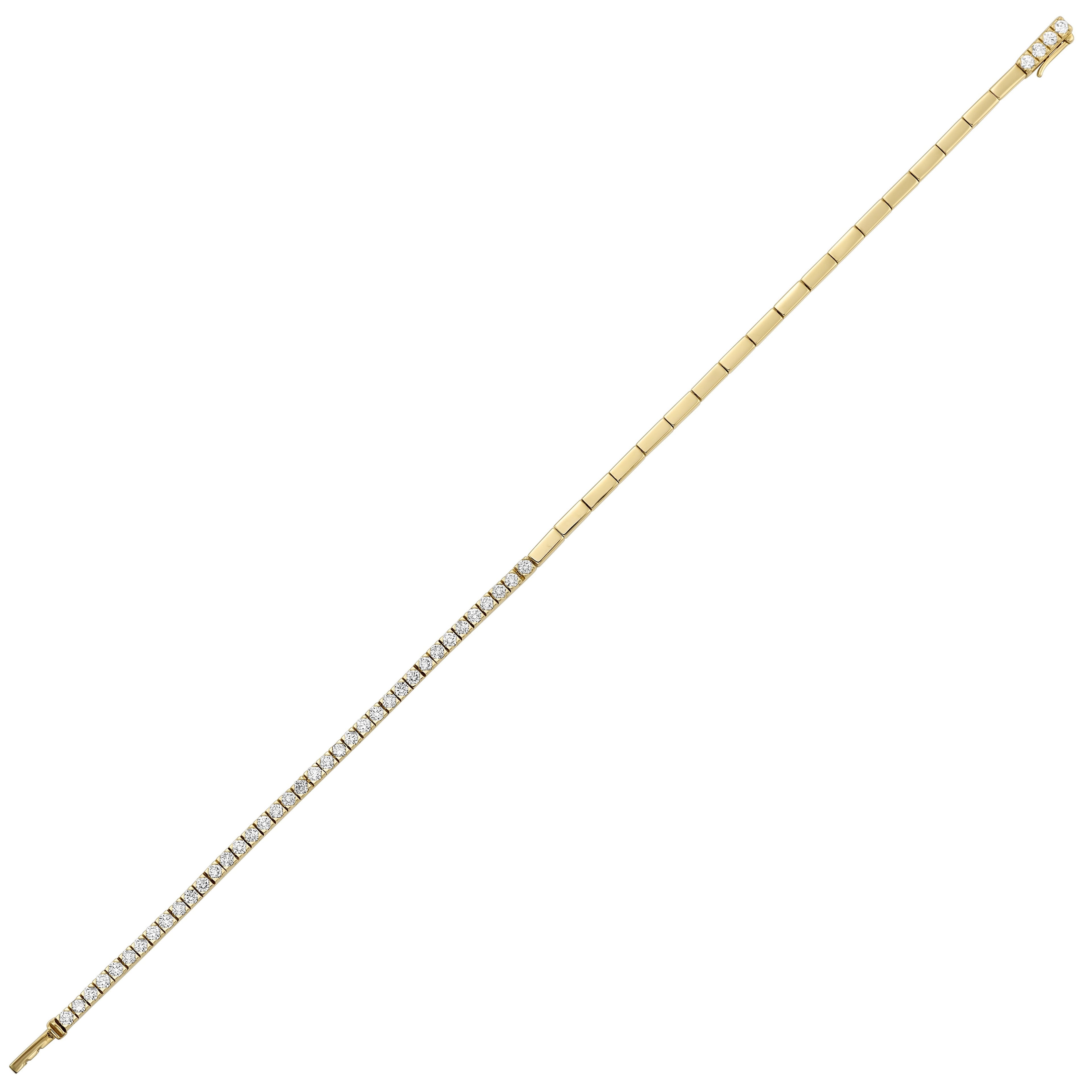 This exquisite yellow gold bracelet merges classic design with a touch of modernity. Seamlessly connecting polished links with a row of radiant diamonds, it shimmers with unmatched charm.