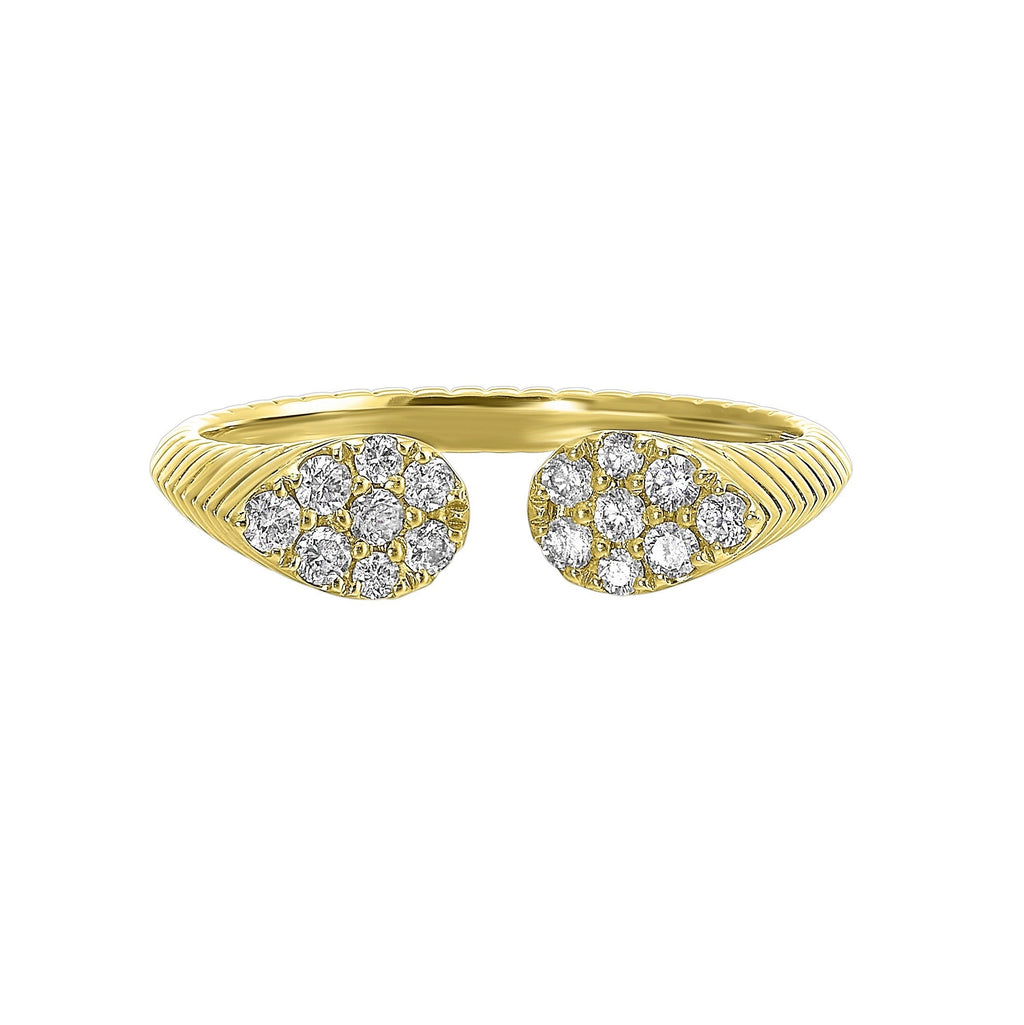 This exquisitely textured yellow gold ring is a royal masterpiece. Its band tapers towards two pear-shaped diamond clusters, converging to create a profile that captures the essence of regal charm.