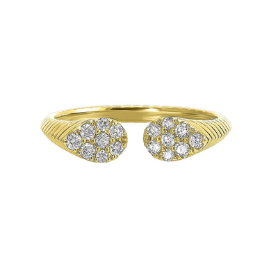 This exquisitely textured yellow gold ring is a royal masterpiece. Its band tapers towards two pear-shaped diamond clusters, converging to create a profile that captures the essence of regal charm.