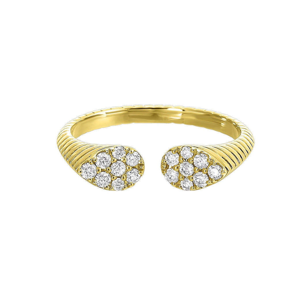 This exquisitely textured yellow gold ring is a royal masterpiece. Its band tapers towards two pear-shaped diamond clusters, converging to create a profile that captures the essence of regal charm.