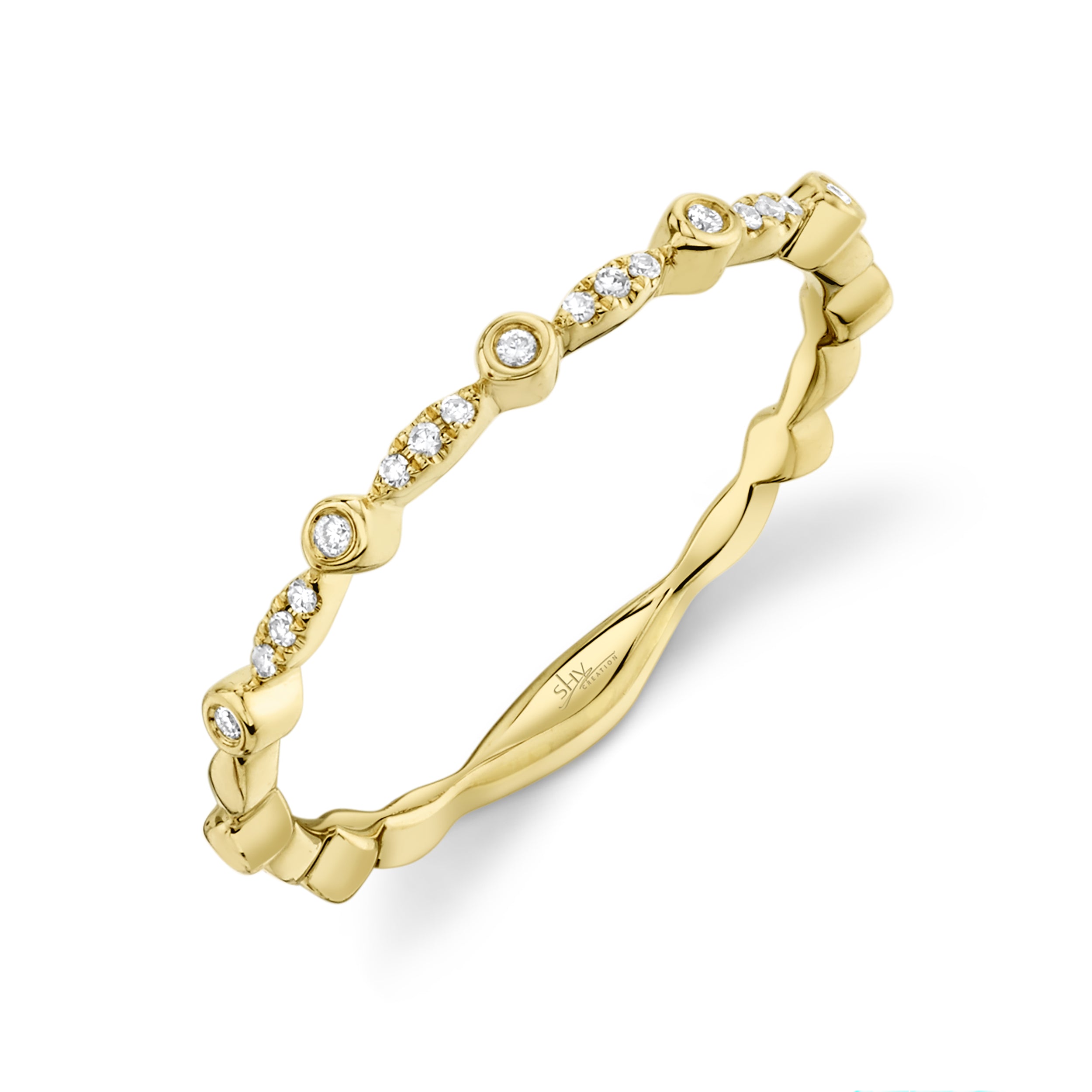 0.06CT 14K Y/G DIAMOND LADY'S BAND SZ 6