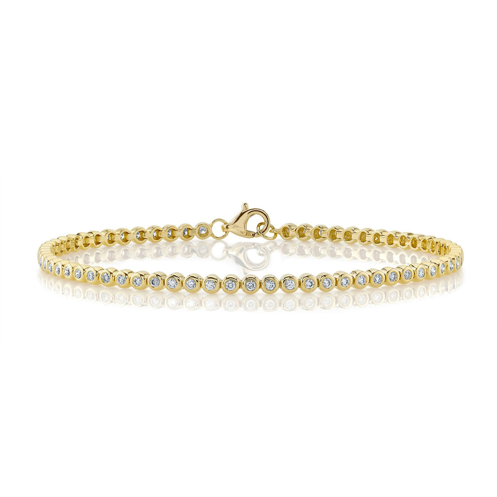 0.64CT 14K Y/G DIAMOND BEZEL TENNIS BRACELET