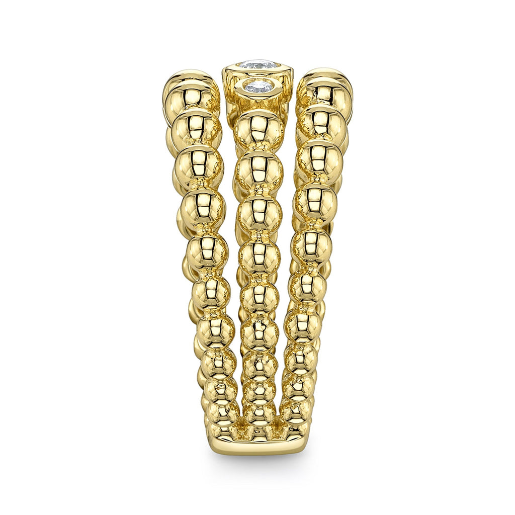 0.31CT 14K Y/G DIAMOND BEZEL RING
