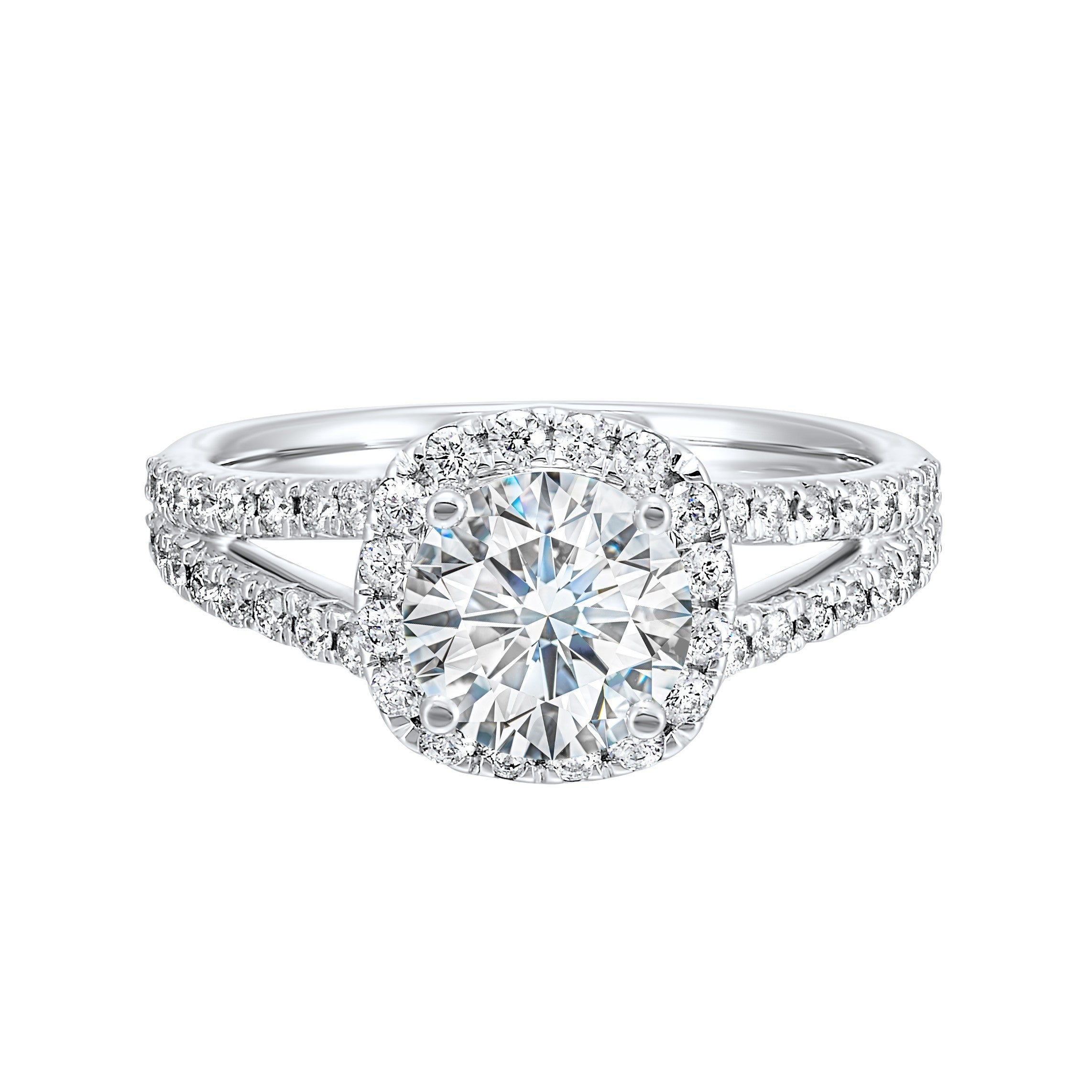 Cushion halo is a stunning way to showcase the round solitaire diamond. Modern split diamond studded shank further highlights the center.