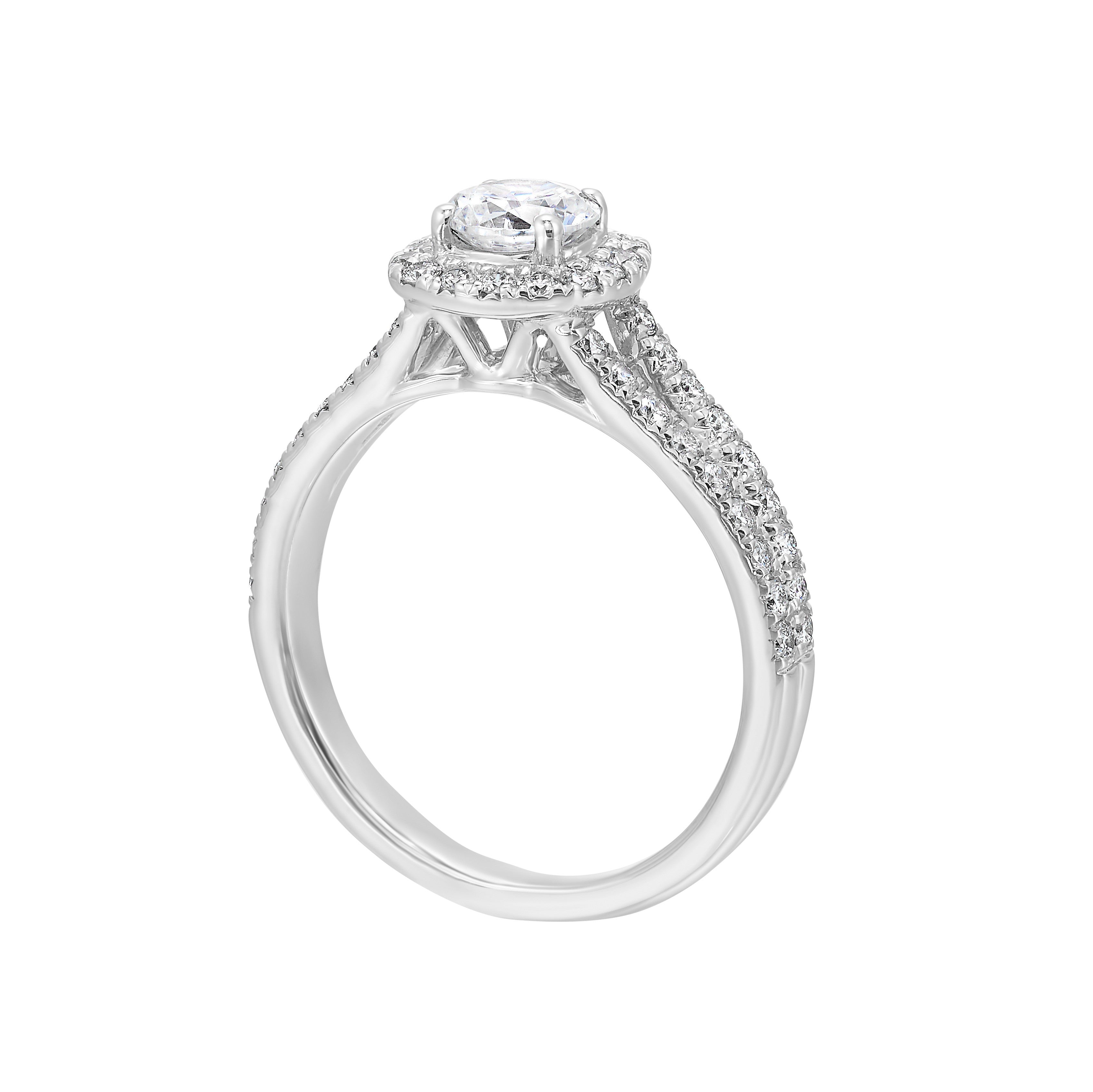 Cushion halo is a stunning way to showcase the round solitaire diamond. Modern split diamond studded shank further highlights the center.