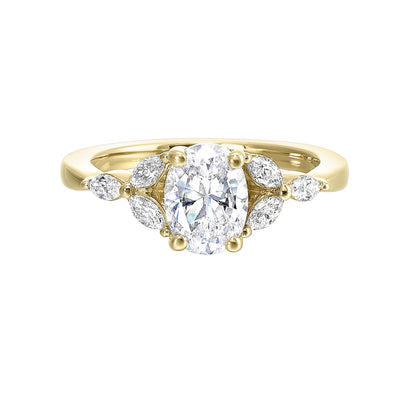 Elongated oval diamond takes center stage, framed by graceful trinity of marquise diamonds set on either side followed by a pinch shank is sure to flatten her.