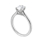 Effortless and classy this dazzling four prong oval solitaire ring features a clean, classic look with a sleek band.