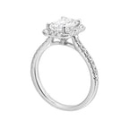 A beautiful emerald cut solitaire set with halo of round diamonds and a diamond studded shank makes this perfect choice of your love story.