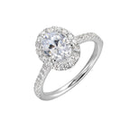 Oval solitaire halo ring with sleek diamond studded shank, this design offers a romantic look for your special moments.