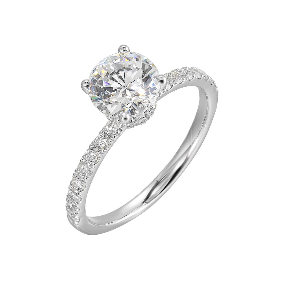 Shine from every angle with this gorgeous round solitaire hidden halo engagement ring. This timeless design offers elegance making it everlasting symbol of your love.