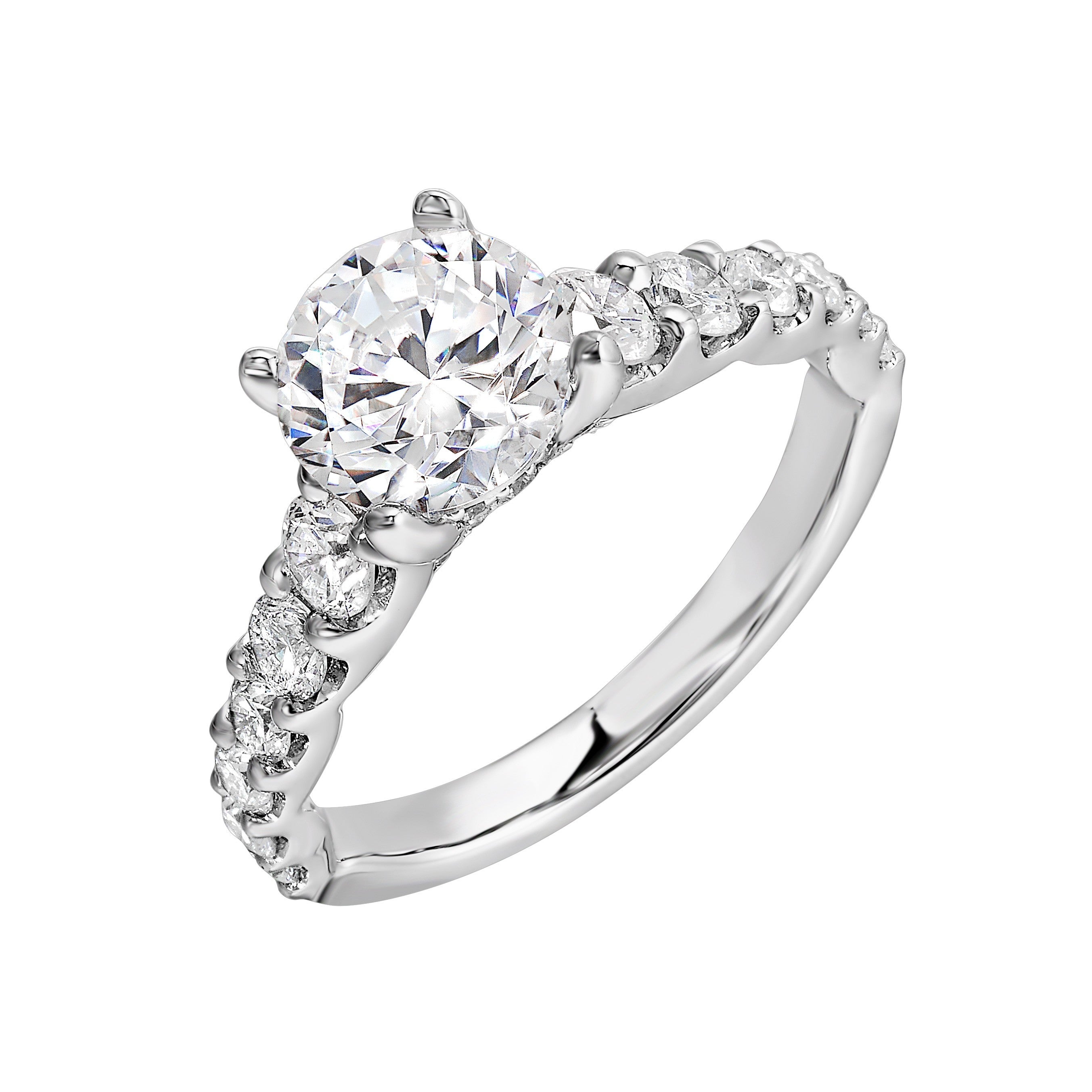 A classic round solitaire elevated by a graduating diamond shank set in common prong offers timeless elegance. Is perfect for your love story.