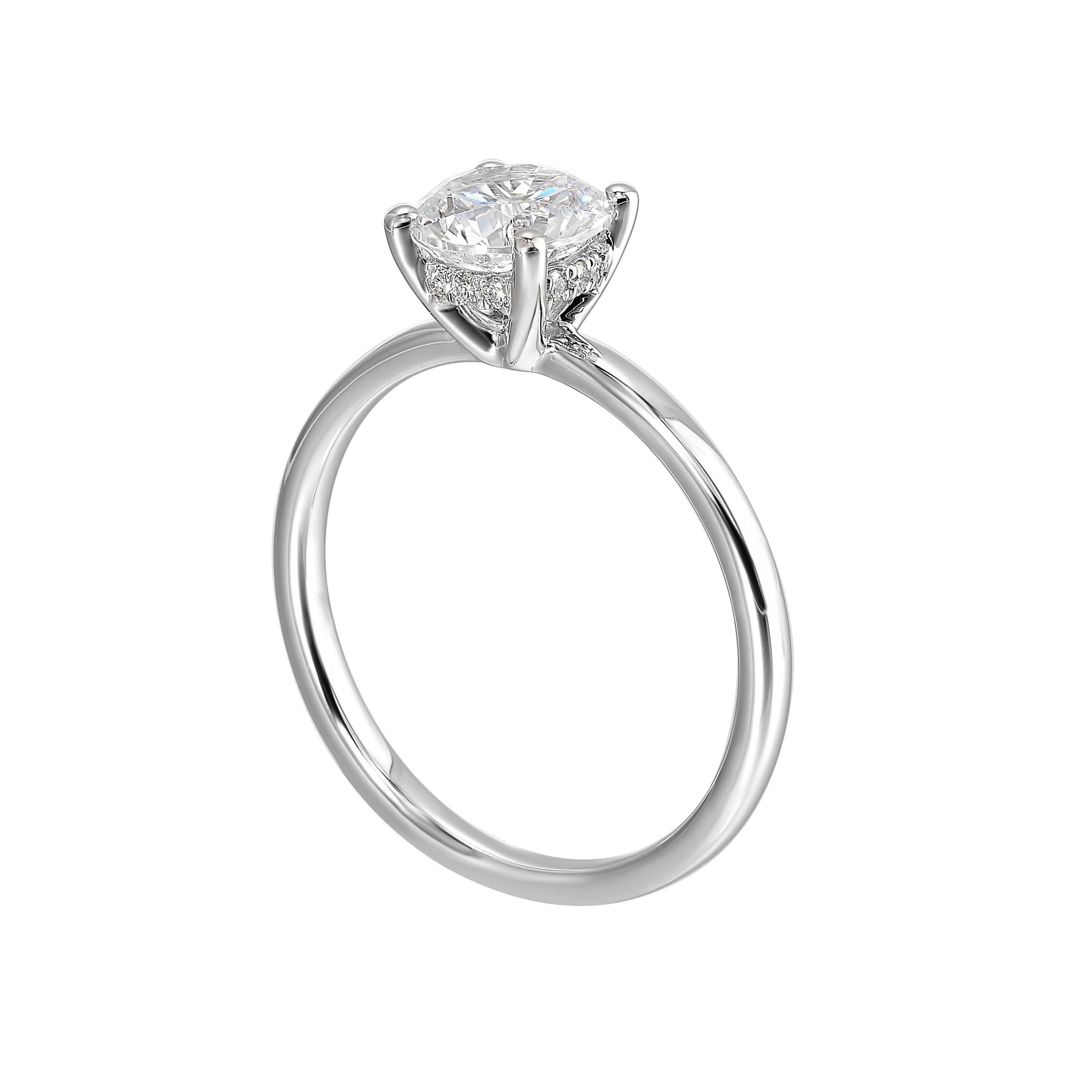 The dazzling solitaire diamond take center stage. The petite band adds to the sleek, classic look.