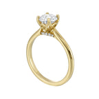 Delicate solitaire ring features a thin metal band that showcases a beaded milgrain in center with added glitters of diamonds in front.
