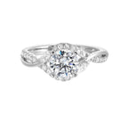 A nature inspired twist on the classic three stone ring. This ring features interwined look with play of pave diamonds and metal.