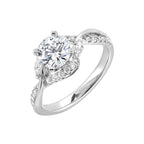 A nature inspired twist on the classic three stone ring. This ring features interwined look with play of pave diamonds and metal.