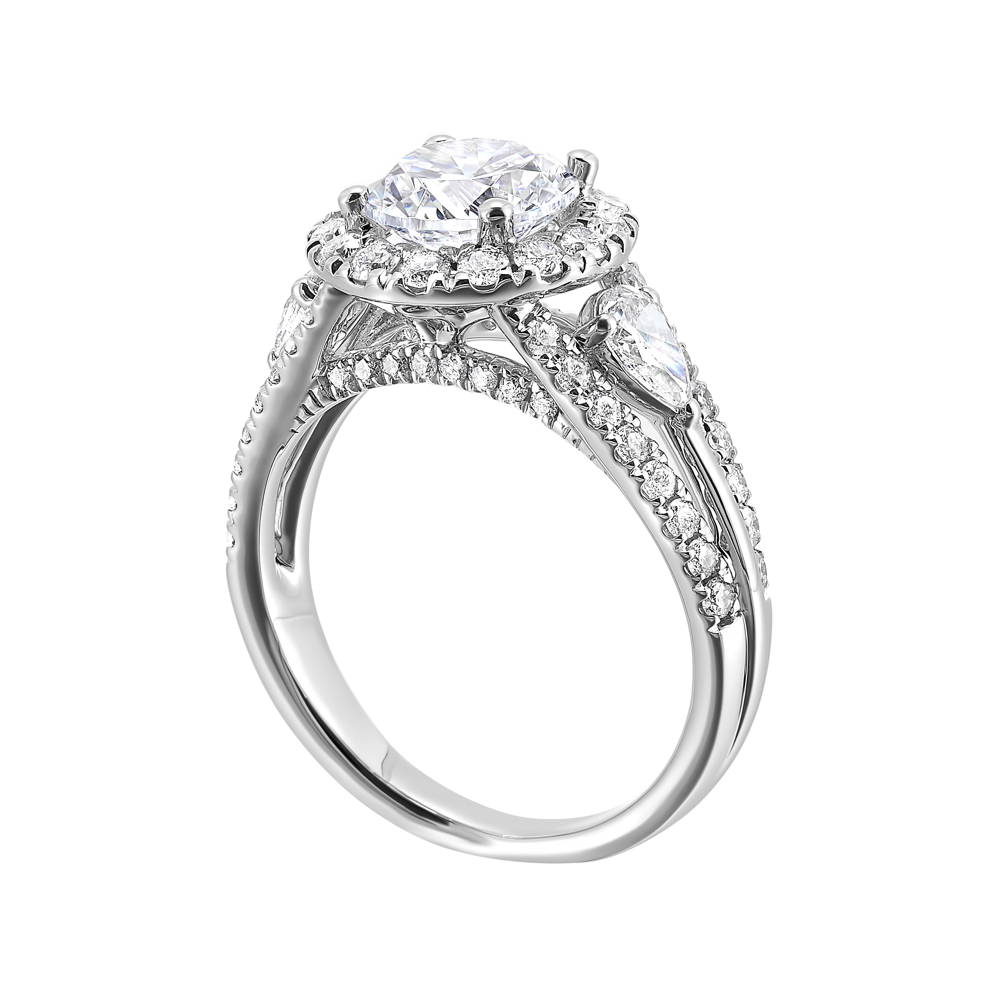 Start your love story with sparkles of this marquise and round diamond three stone engagement ring. The three rows shank have a beautiful split with pave studded diamonds on the sides.