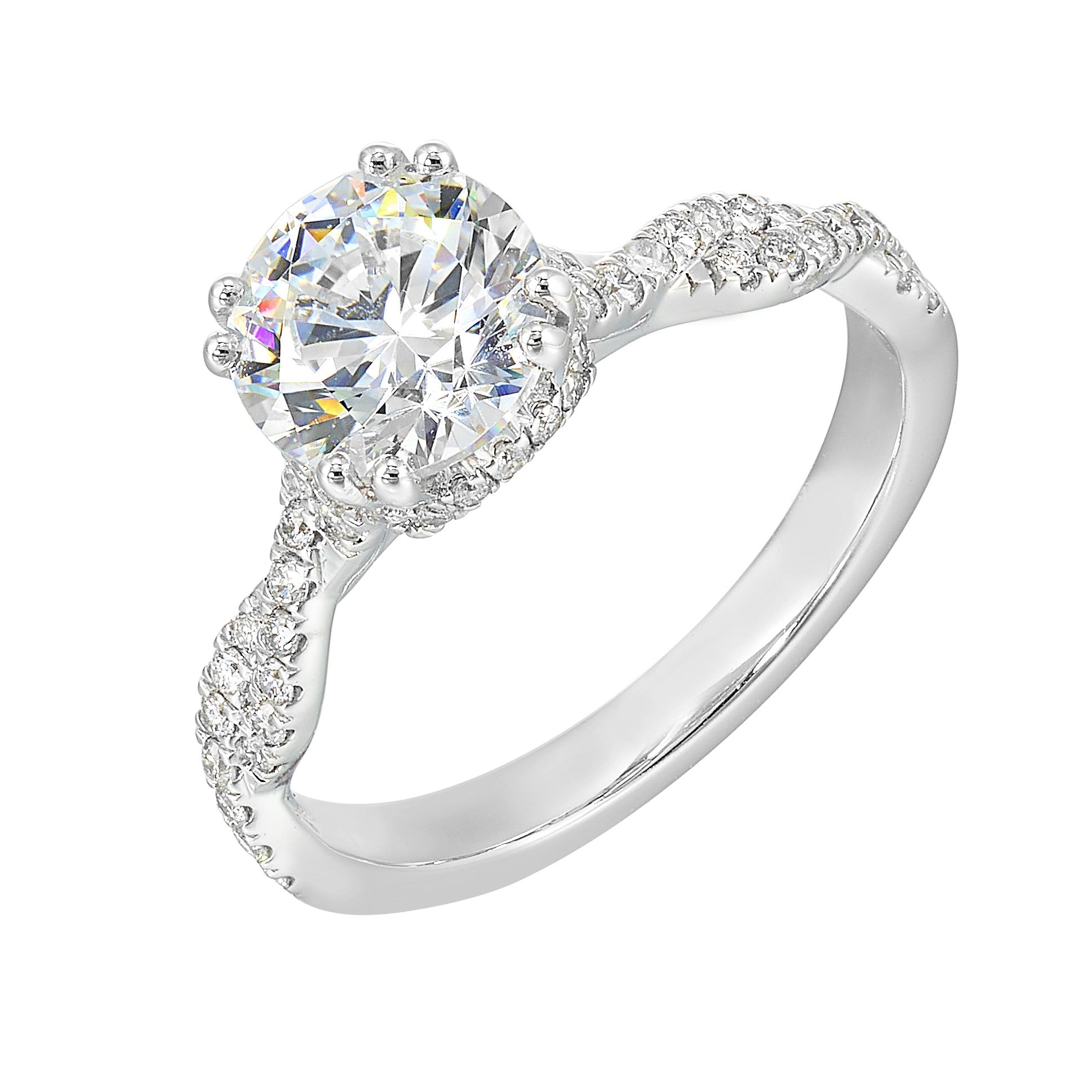 Stunning with a round solitaire diamond set in dual prongs atop a modern crisscross band. The unique twist on timeless elegance is perfect for the modern bride.