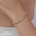 3.25CT 14K Y/G DIAMOND BAGUETTE BEZEL TENNIS BRACELET