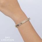 0.97CT 14K Y/G DIAMOND BANGLE