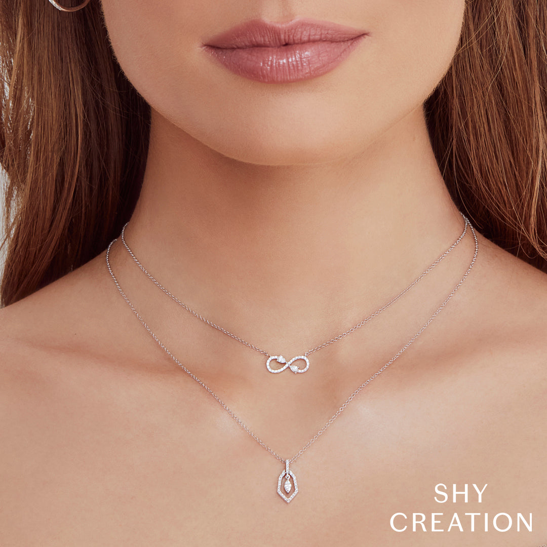 0.22CT 14K W/G DIAMOND PEAR INFINITY NECKLACE