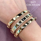 1.08CT 14K Y/G DIAMOND BAGUETTE MARQUISE BANGLE