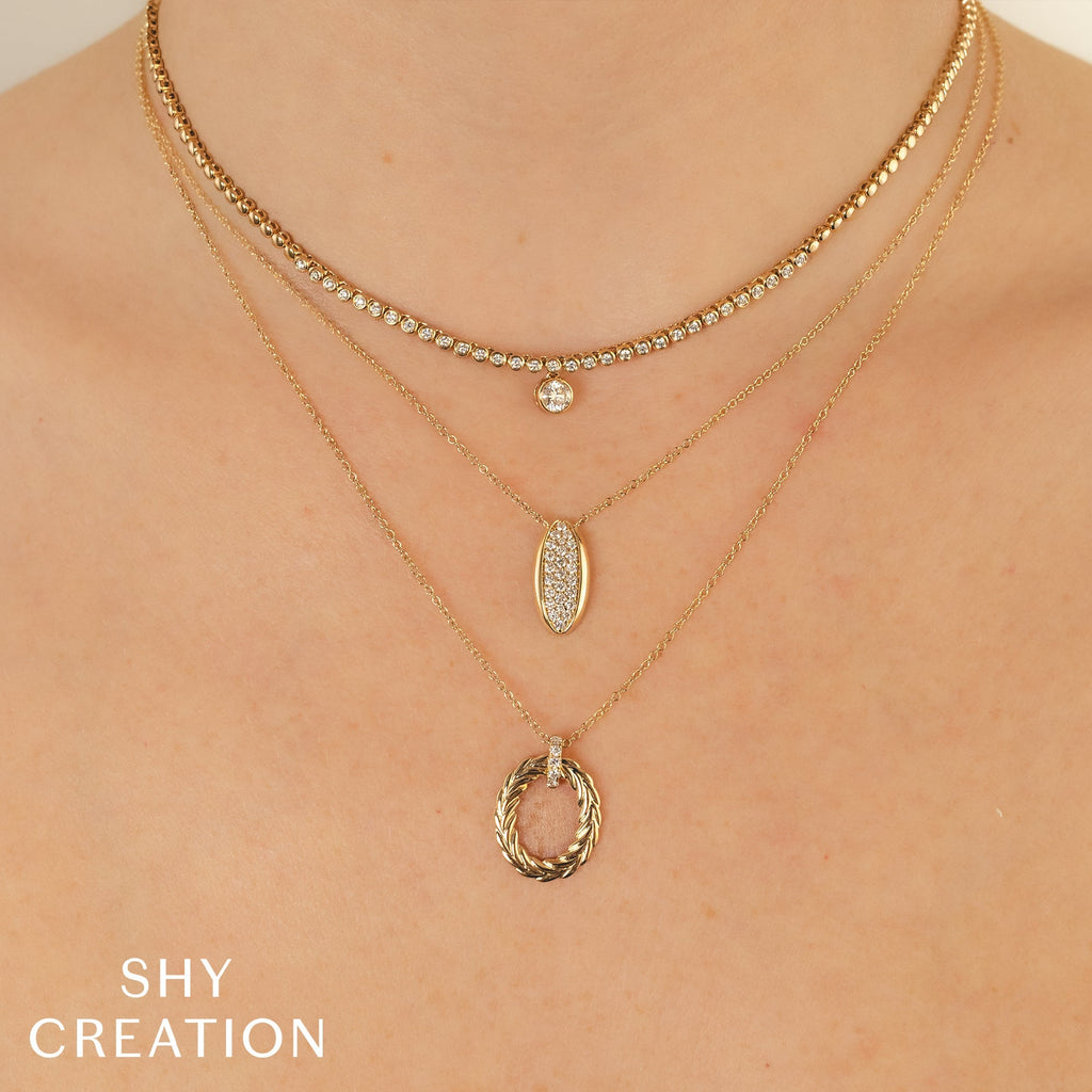 0.69CT 14K Y/G DIAMOND BEZEL NECKLACE