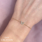 0.08CT 14K R/G DIAMOND BUTTERFLY BRACELET