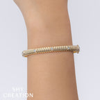 0.33CT 14K Y/G DIAMOND BEZEL RIBBED BANGLE