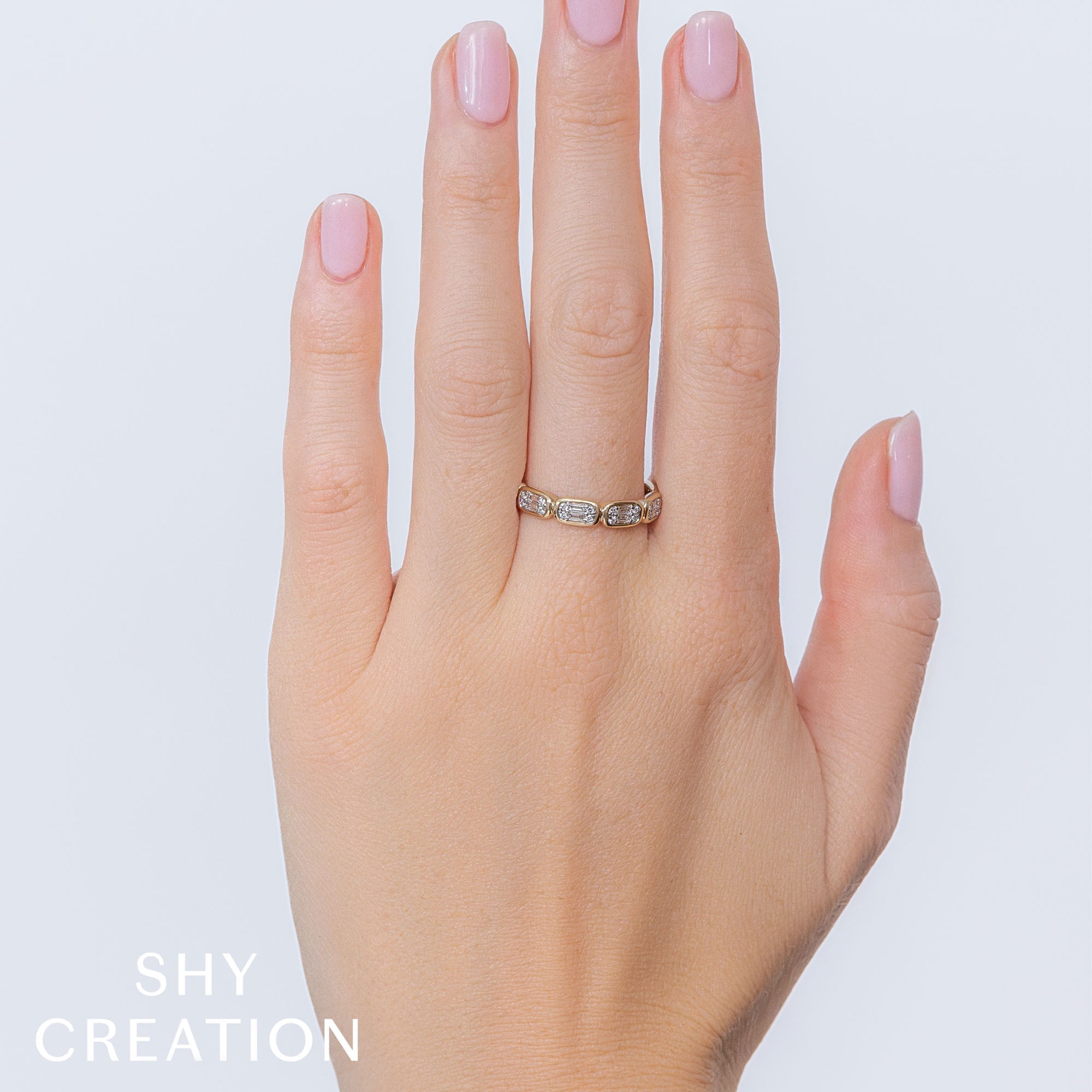 0.29CT 14K Y/G DIAMOND BAGUETTE BAND