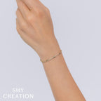 0.54CT 14K Y/G DIAMOND BEZEL GEO CUT BRACELET